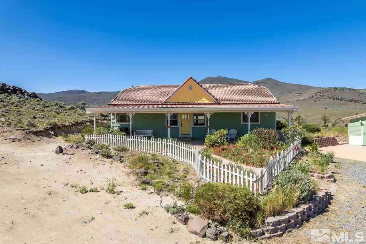 3415 Basque Oven Road Reno, NV 89510 - Photo 5 of 32 a front view of a house with a yard
