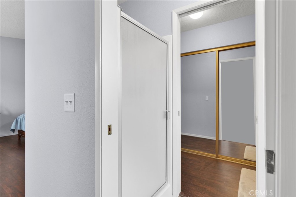 9224 Beekley Road Phelan, CA 92371 - Photo 24 of 52 a bathroom with a glass shower door