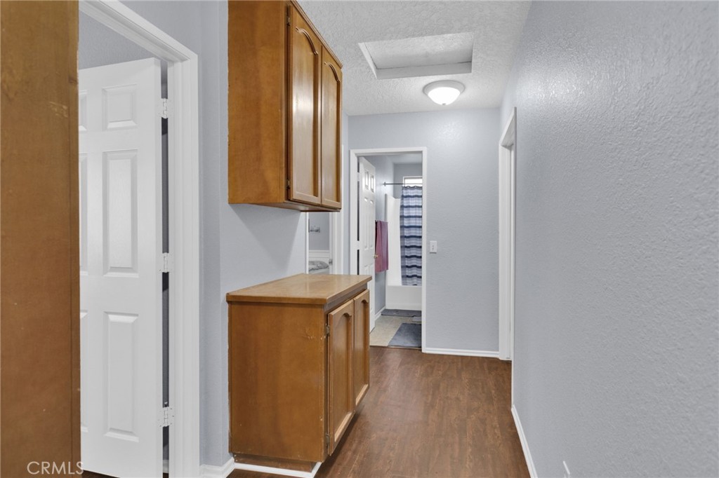 9224 Beekley Road Phelan, CA 92371 - Photo 28 of 52 a view of a hallway with wooden floor