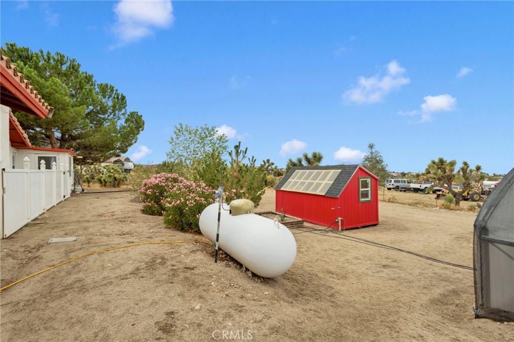 9224 Beekley Road Phelan, CA 92371 - Photo 32 of 52 a bathroom with a sink mirror and vanity