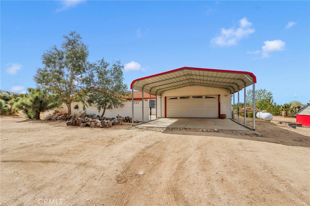 9224 Beekley Road Phelan, CA 92371 - Photo 4 of 52 a view of a house with a snow in the yard