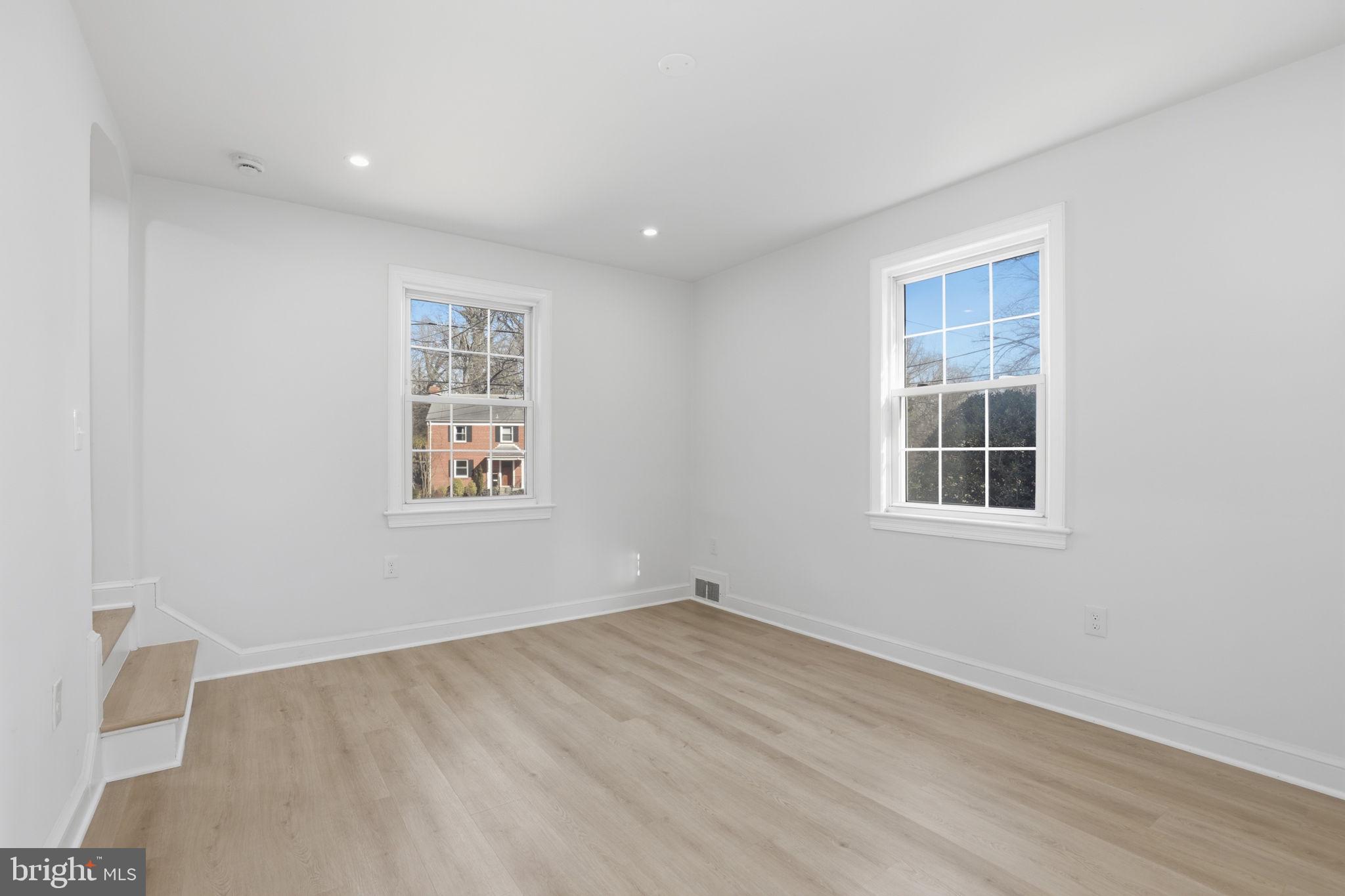 311 Ellsworth Drive Silver Spring, MD 20910 - Photo 23 of 65 a view of empty room with windows
