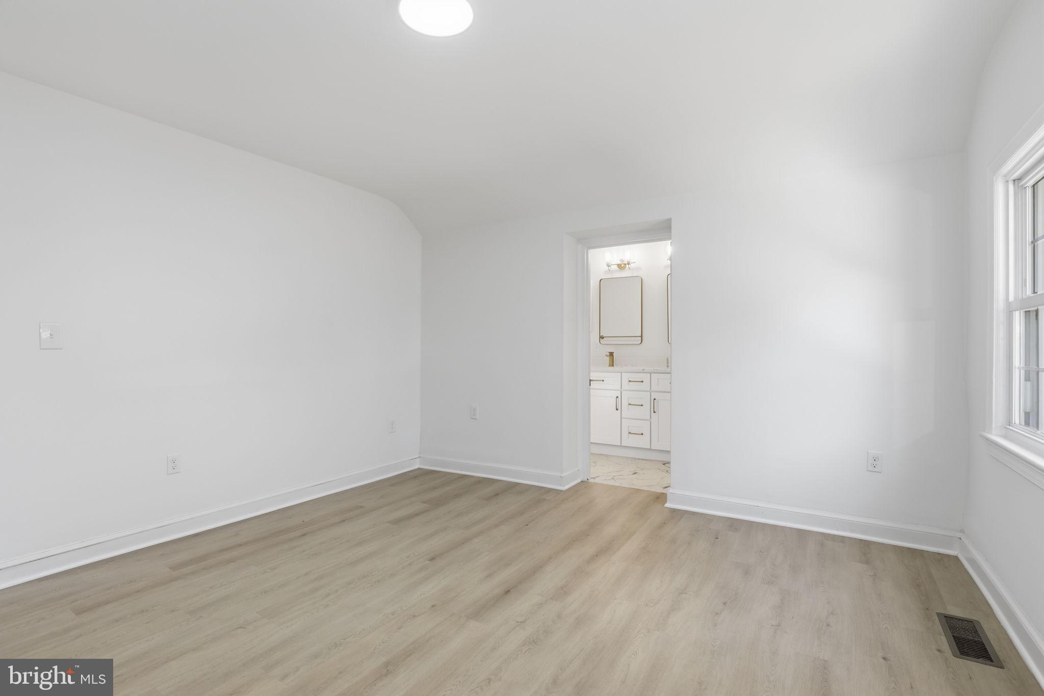 311 Ellsworth Drive Silver Spring, MD 20910 - Photo 28 of 65 wooden floor in an empty room