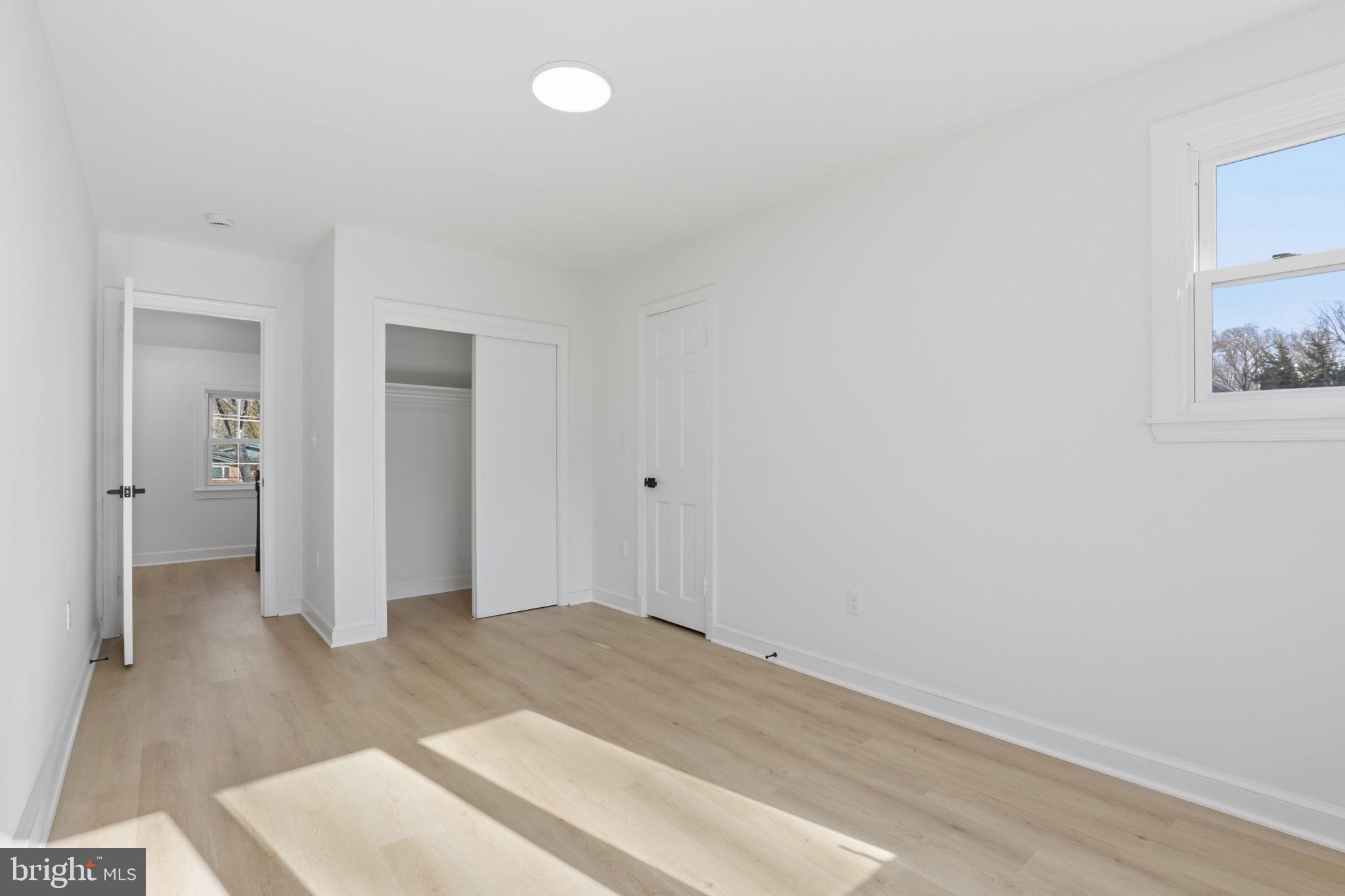 311 Ellsworth Drive Silver Spring, MD 20910 - Photo 36 of 65 a view of a room with wooden floor and bathroom