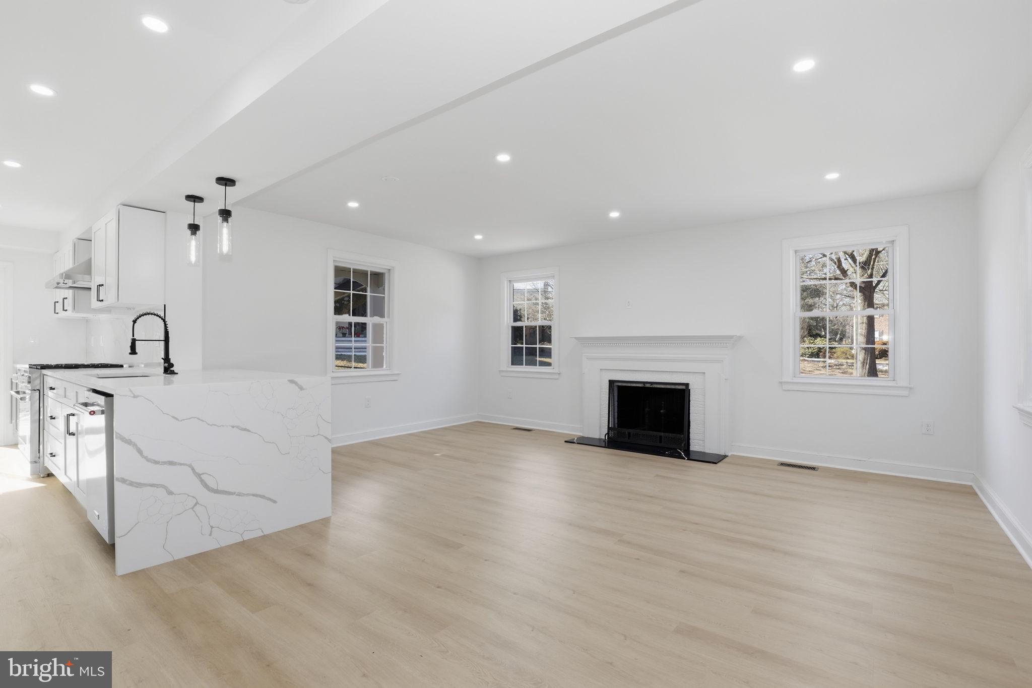311 Ellsworth Drive Silver Spring, MD 20910 - Photo 5 of 65 a view of a livingroom with a fireplace