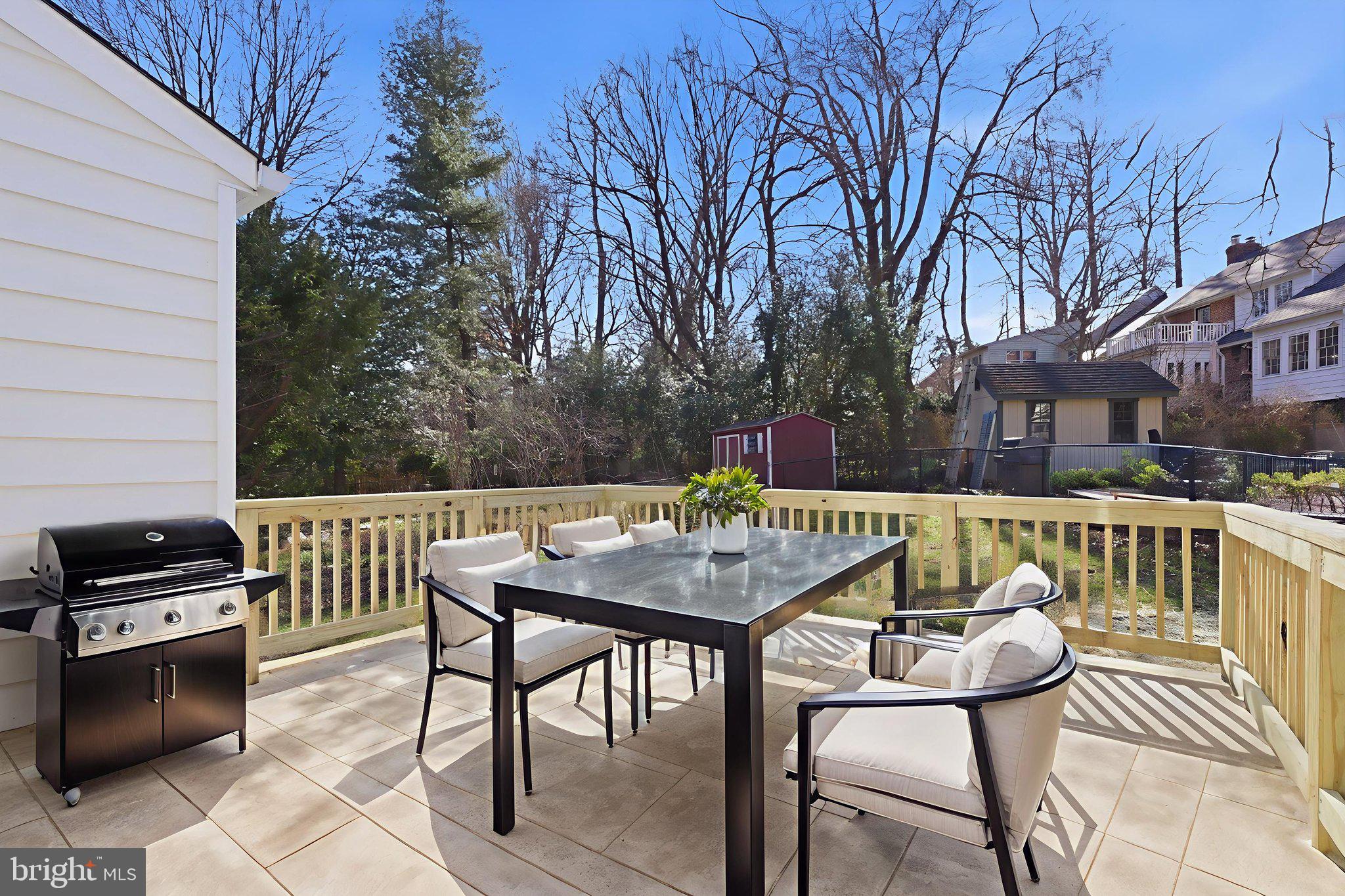 311 Ellsworth Drive Silver Spring, MD 20910 - Photo 56 of 65 a view of a chairs and table in the patio