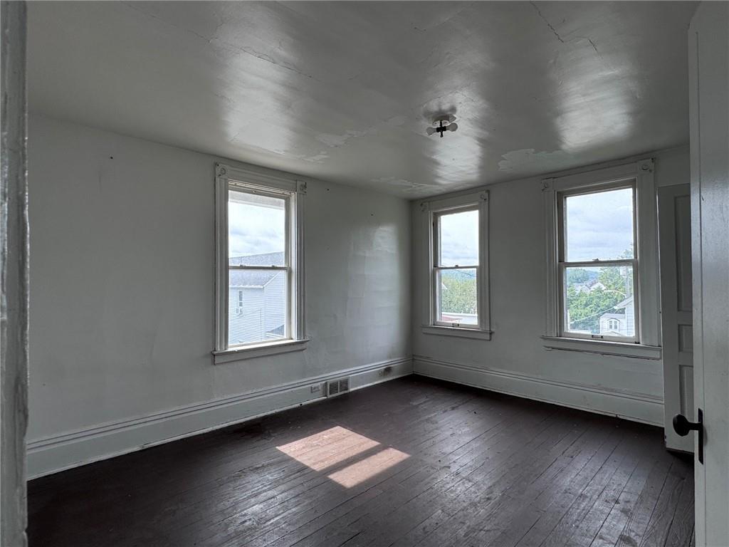 441 5th Street Donora, PA 15033 - Photo 12 of 16 an empty room with wooden floor and windows