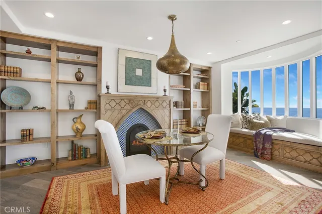 a view of living room filled with furniture