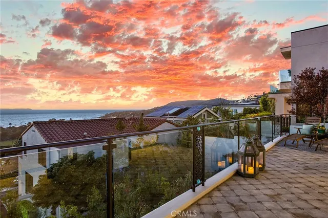 a view of swimming pool with seating space