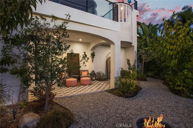 a bedroom with a bed and ceiling fan