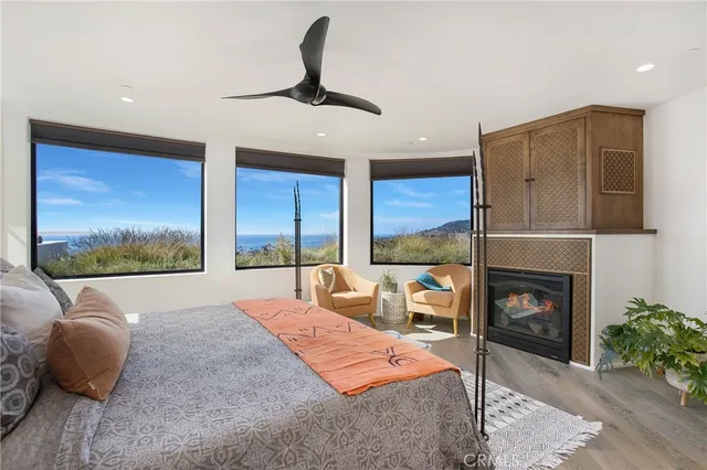a kitchen with stainless steel appliances a sink a counter space and a window