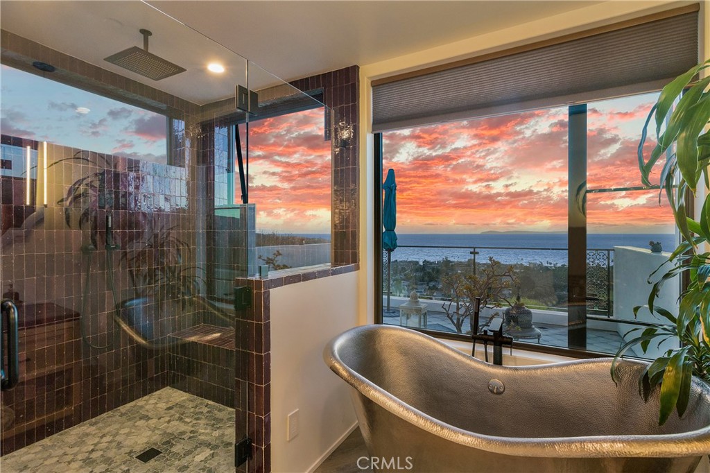 825 Coast View Drive Laguna Beach, CA 92651 - Photo 39 of 63 a view of a living room and floor to ceiling window or tub