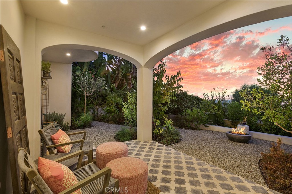 825 Coast View Drive Laguna Beach, CA 92651 - Photo 47 of 63 a outdoor living space with furniture and garden view