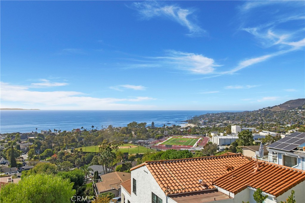 825 Coast View Drive Laguna Beach, CA 92651 - Photo 54 of 63 an aerial view of residential houses with city view