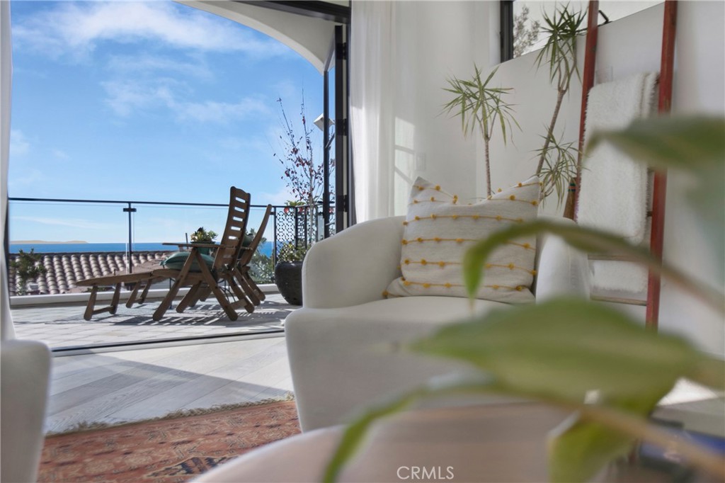 825 Coast View Drive Laguna Beach, CA 92651 - Photo 57 of 63 a view of balcony with furniture