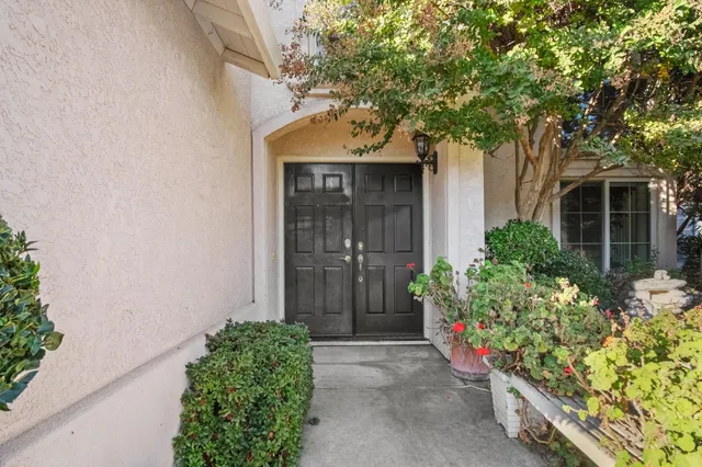 front view of a house with a small yard
