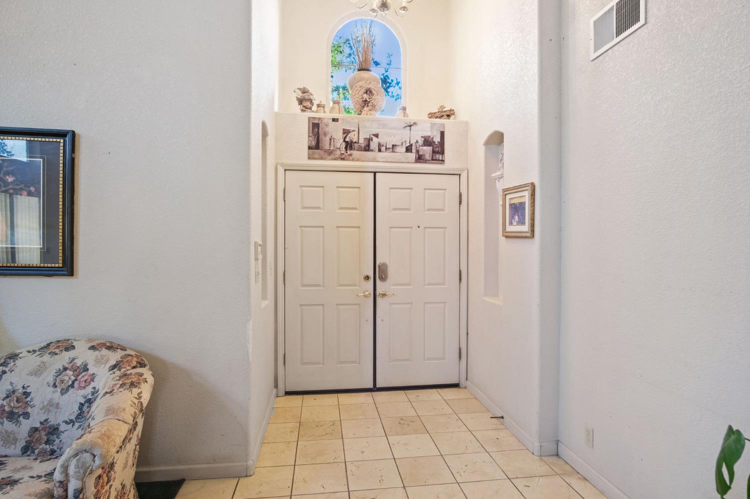 2805 Medinah Way Modesto, CA 95355 - Photo 6 of 39 a room with a mirror and cabinets