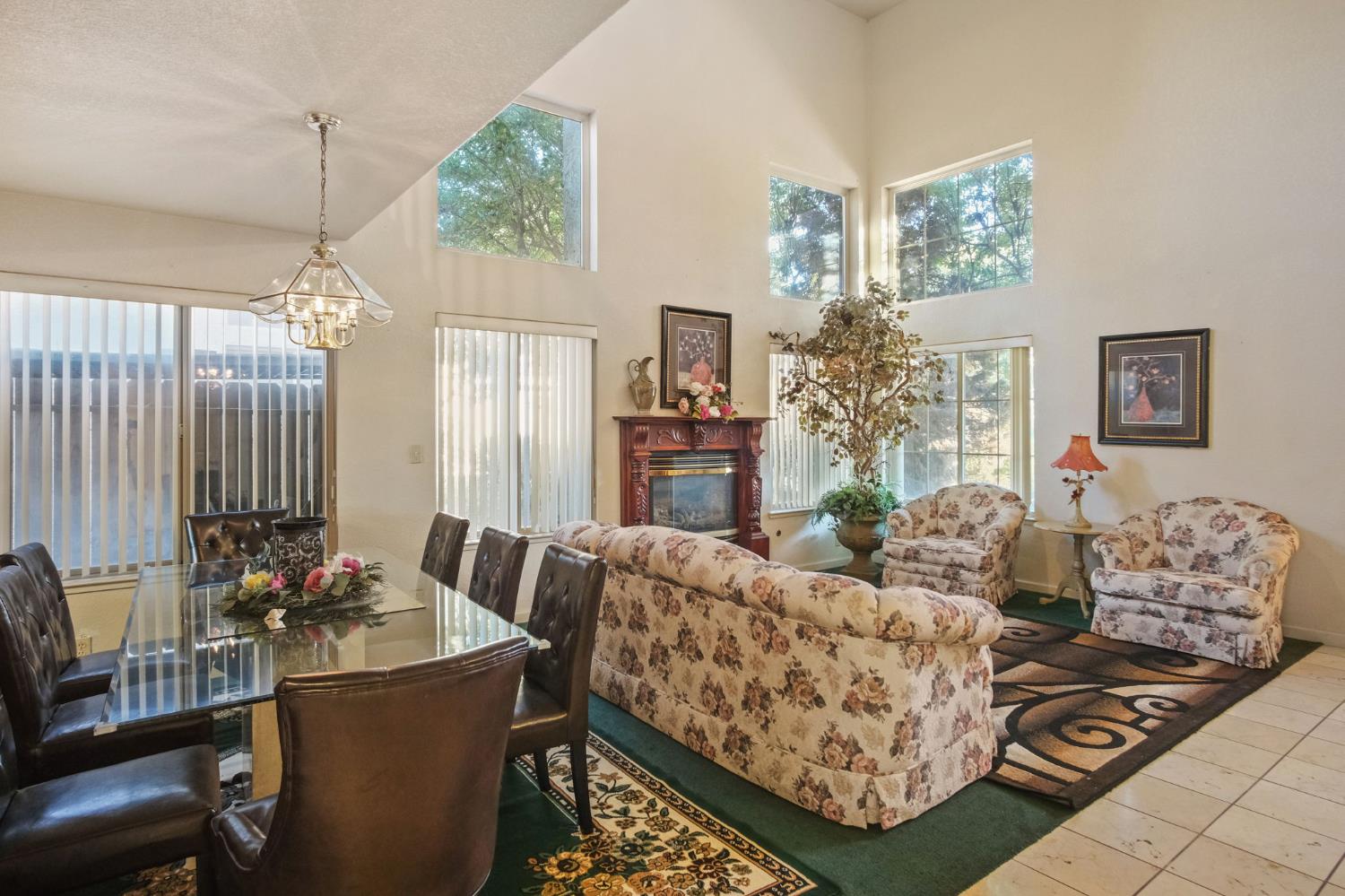2805 Medinah Way Modesto, CA 95355 - Photo 10 of 39 a living room with furniture and a chandelier