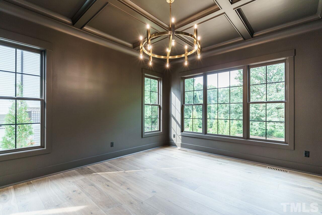 2535 Wake Drive Raleigh, NC 27608 - Photo 13 of 51 a view of an empty room with a window