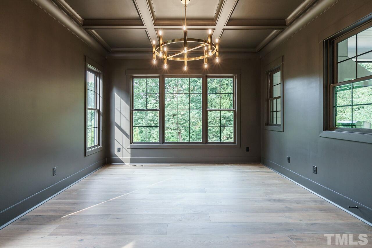 2535 Wake Drive Raleigh, NC 27608 - Photo 14 of 51 a view of an empty room with a window
