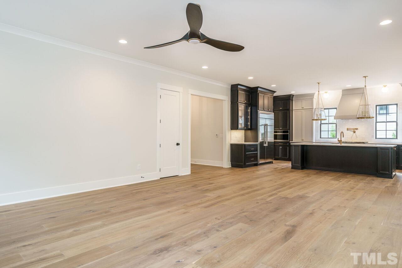 2535 Wake Drive Raleigh, NC 27608 - Photo 19 of 51 a view of a kitchen with a sink and a window