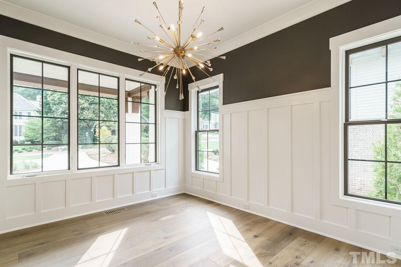 2535 Wake Drive Raleigh, NC 27608 - Photo 5 of 51 a view of an empty room with a window