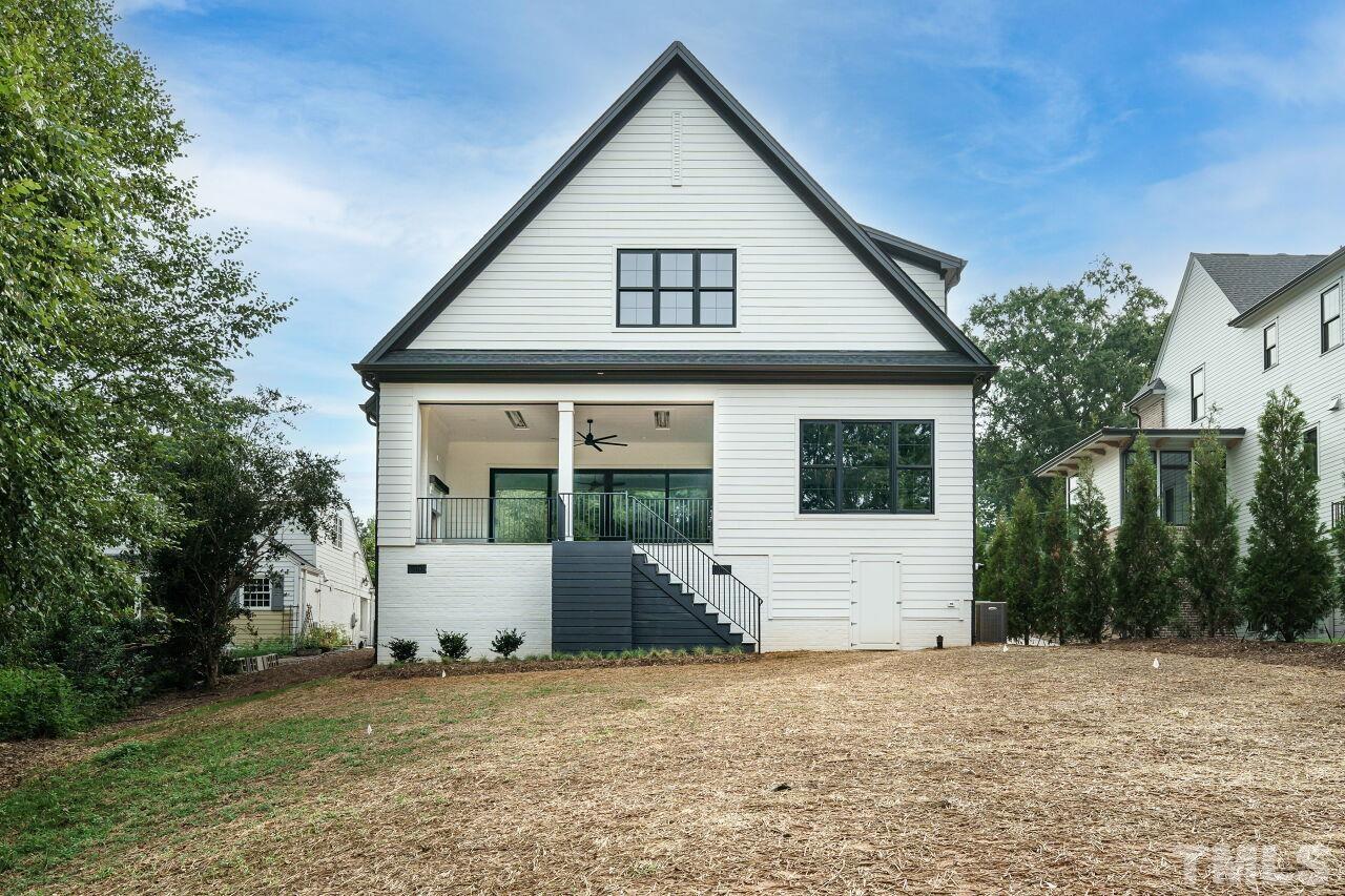 2535 Wake Drive Raleigh, NC 27608 - Photo 51 of 51 a front view of house with garage and trees