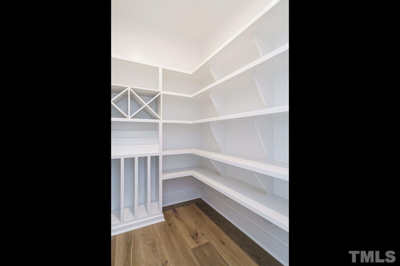 2535 Wake Drive Raleigh, NC 27608 - Photo 8 of 51 a view of an empty walk in closet