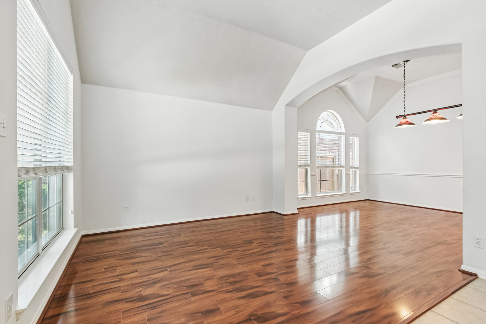 31235 Windcrest Park Lane Spring, TX 77386 - Photo 17 of 50 a view of empty room with wooden floor and fan
