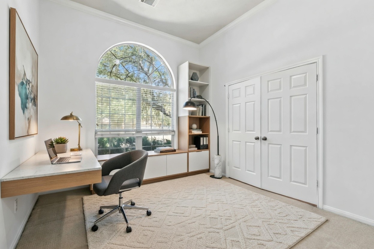 31235 Windcrest Park Lane Spring, TX 77386 - Photo 18 of 50 a view of a livingroom with workspace and a window