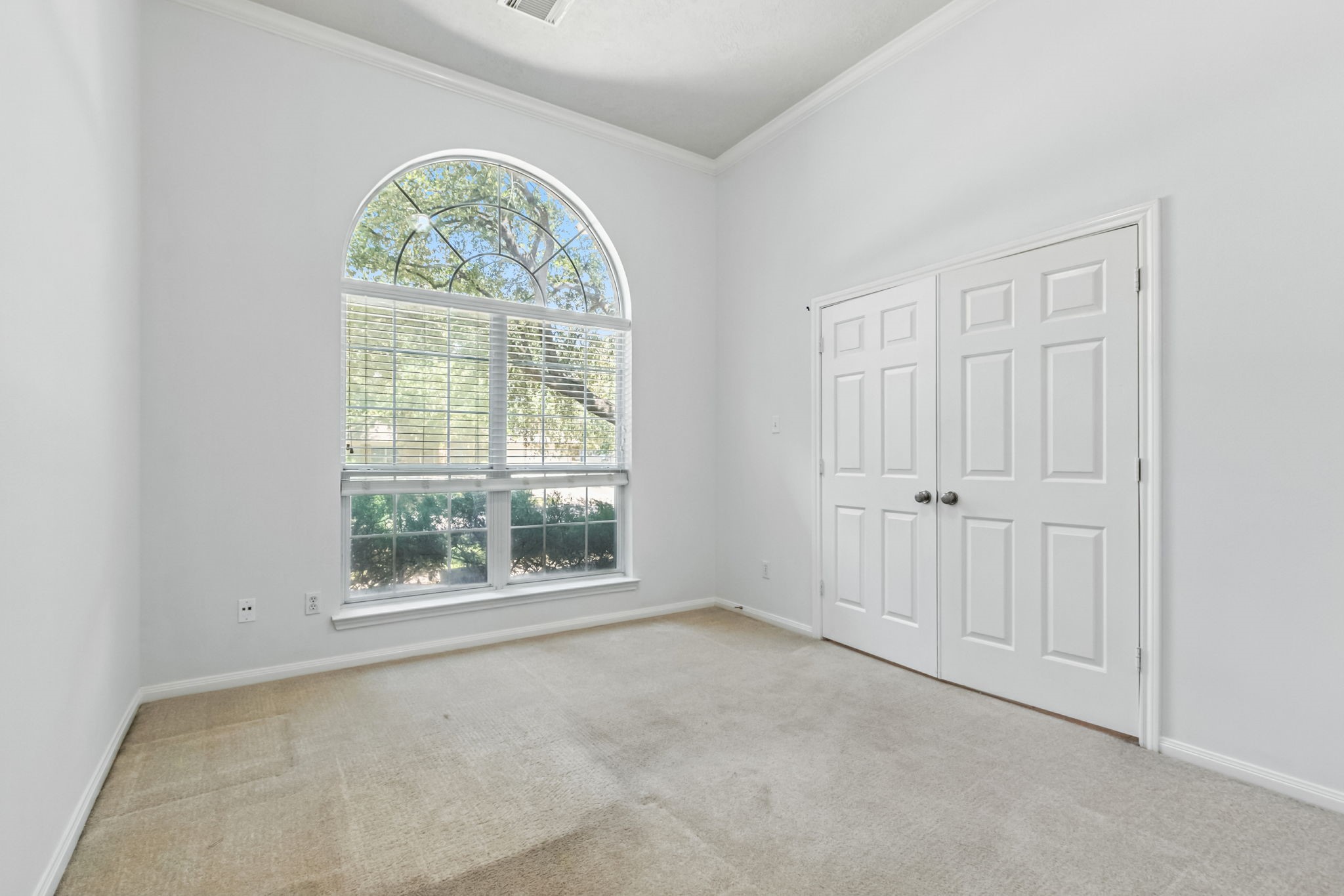 31235 Windcrest Park Lane Spring, TX 77386 - Photo 19 of 50 an empty room with a window