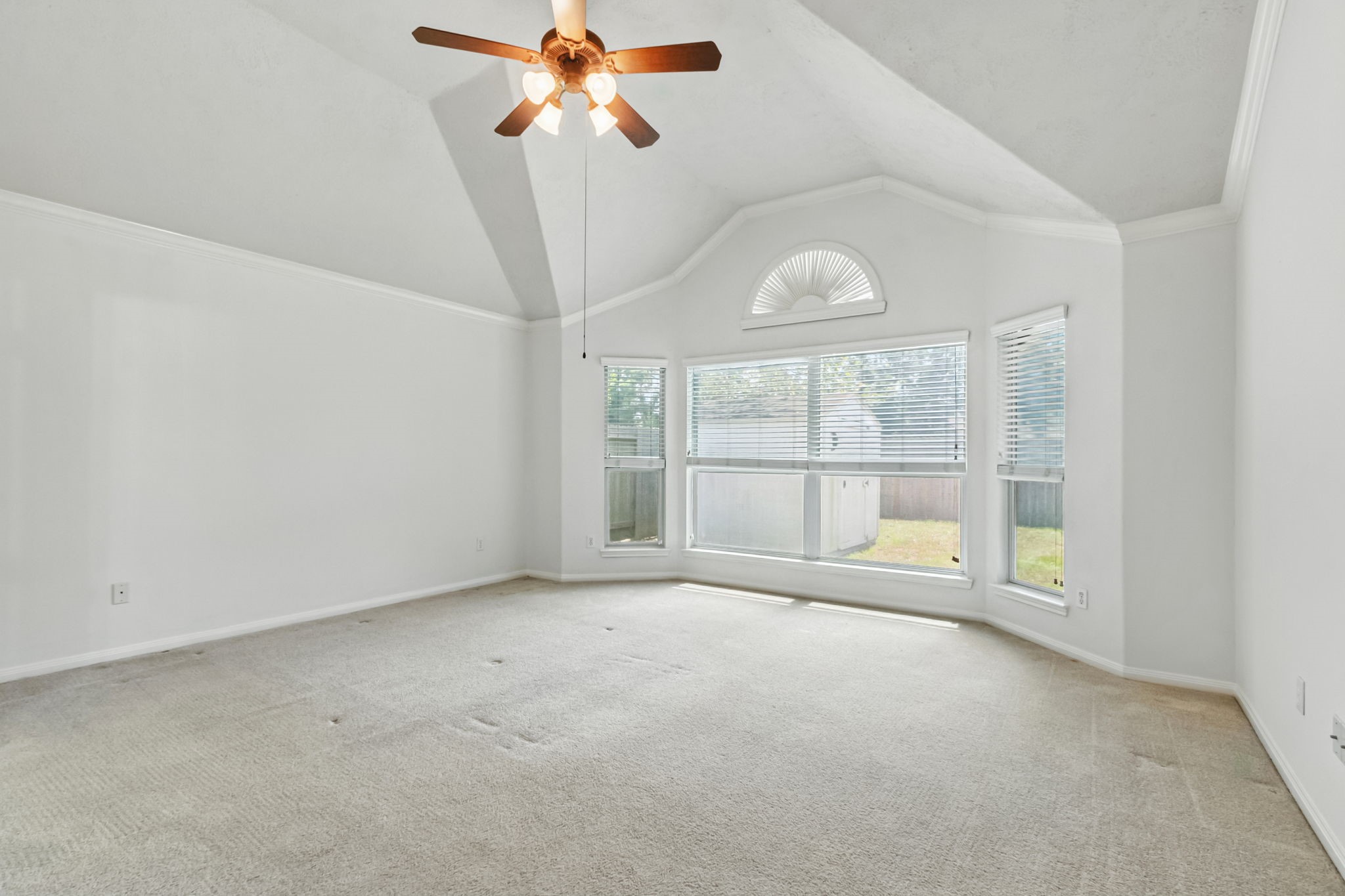 31235 Windcrest Park Lane Spring, TX 77386 - Photo 21 of 50 a view of an empty room with a window