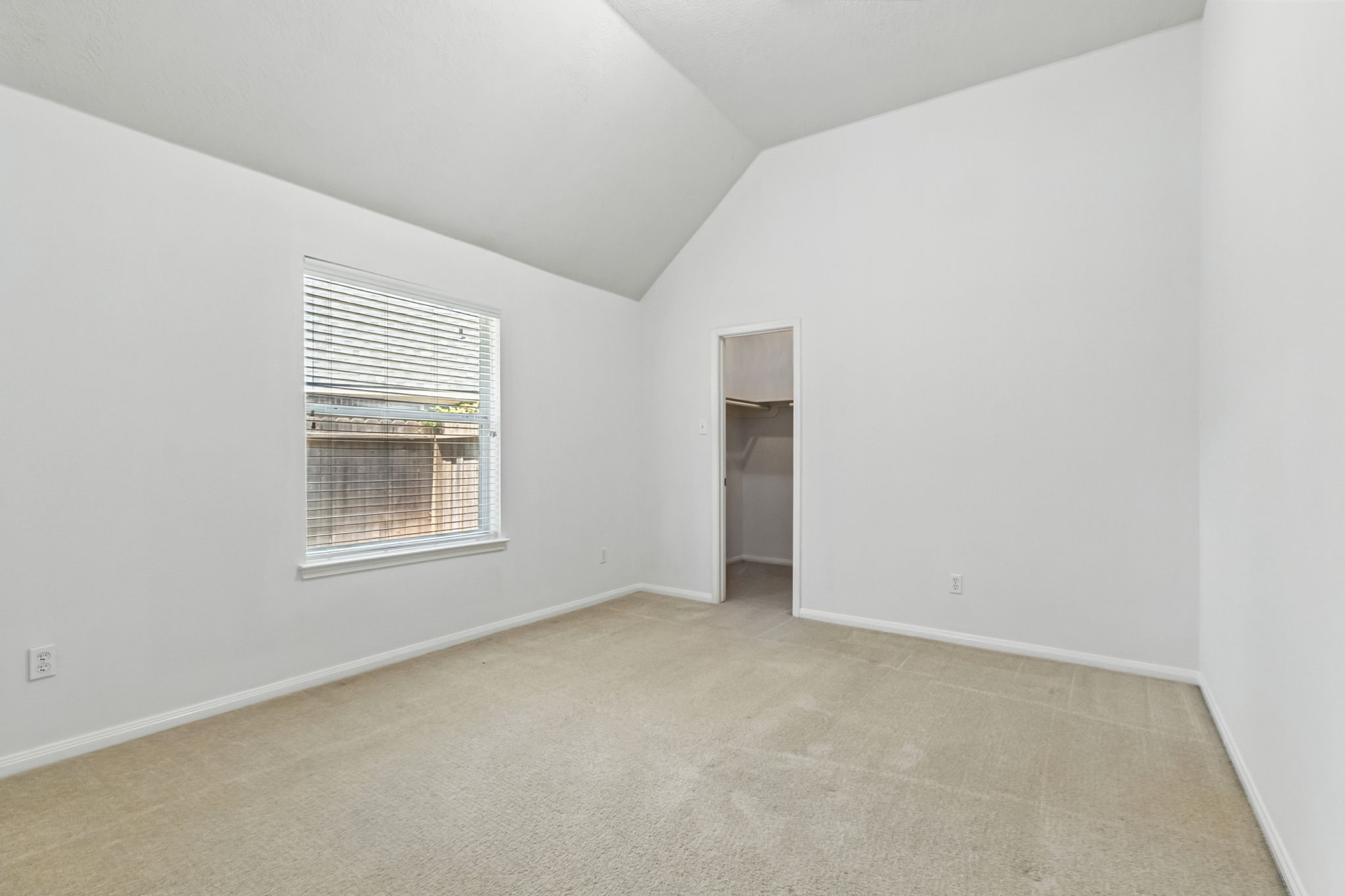 31235 Windcrest Park Lane Spring, TX 77386 - Photo 28 of 50 an empty room with windows