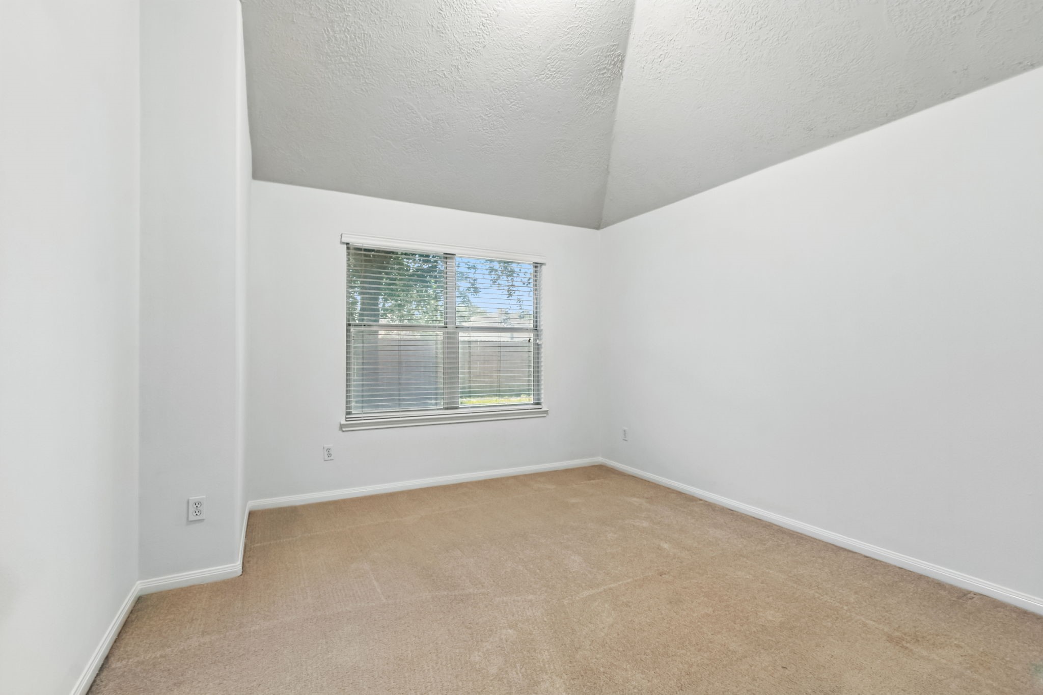 31235 Windcrest Park Lane Spring, TX 77386 - Photo 29 of 50 an empty room with a window