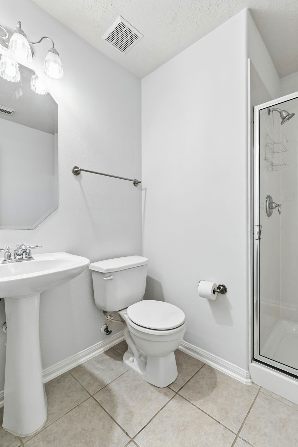 31235 Windcrest Park Lane Spring, TX 77386 - Photo 32 of 50 a bathroom with a sink a toilet and shower