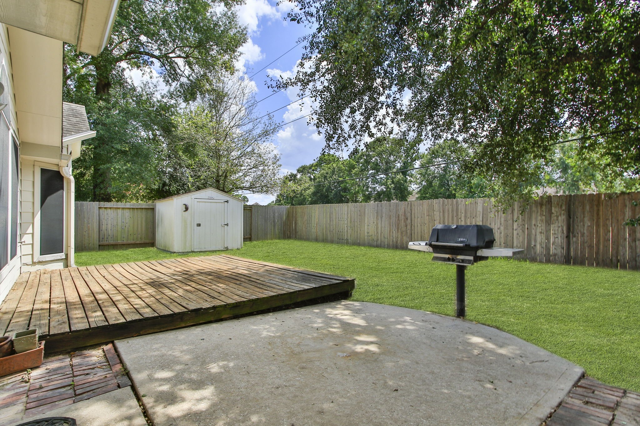 31235 Windcrest Park Lane Spring, TX 77386 - Photo 35 of 50 a view of a backyard with furniture