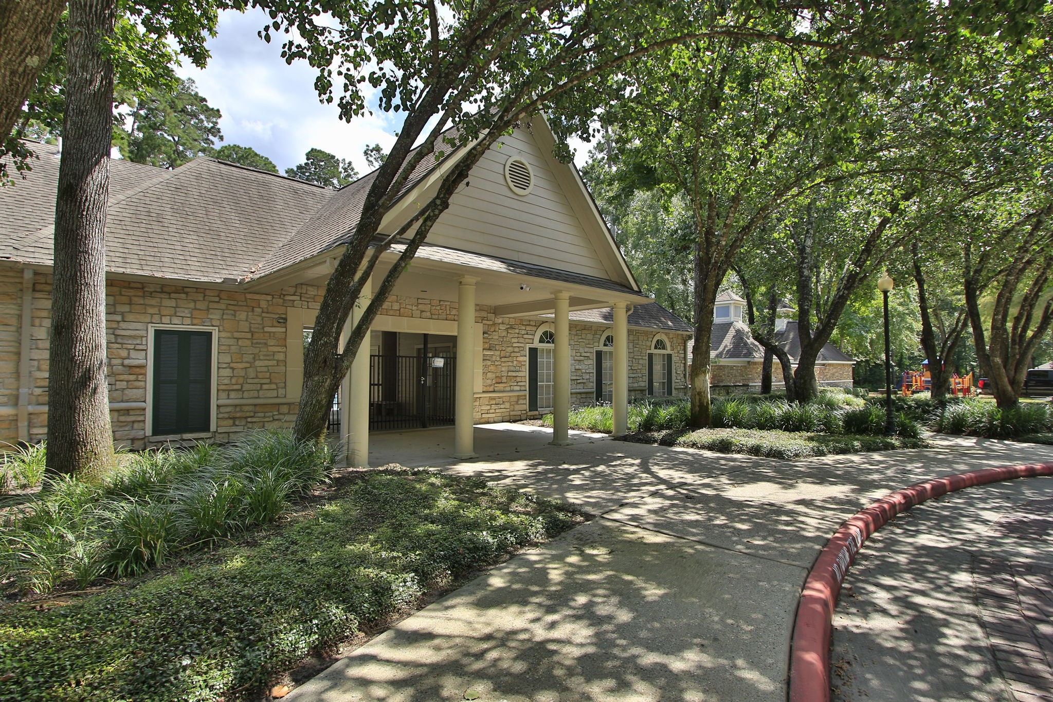 31235 Windcrest Park Lane Spring, TX 77386 - Photo 40 of 50 a front view of a house with a yard
