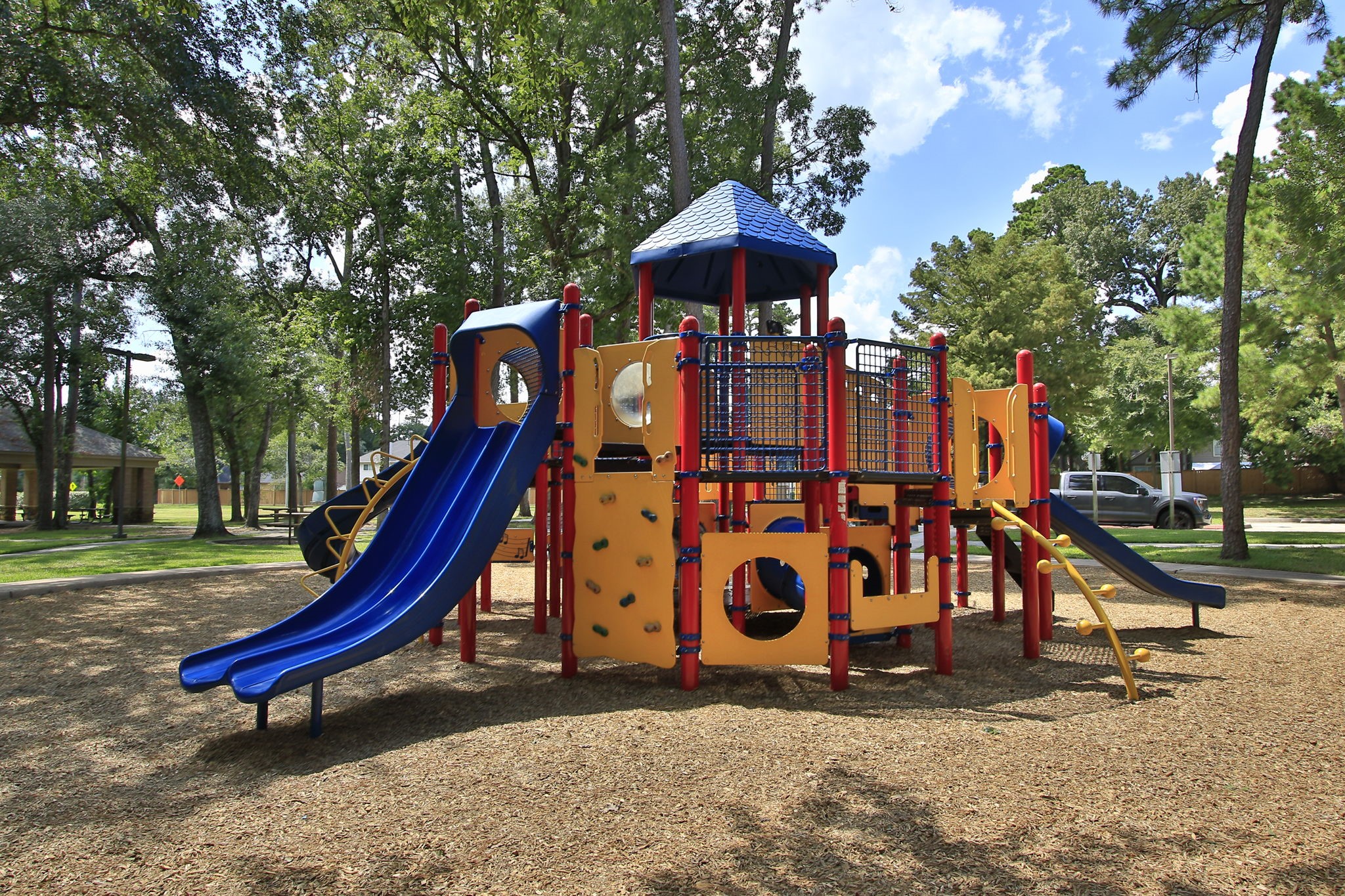 31235 Windcrest Park Lane Spring, TX 77386 - Photo 42 of 50 a view of outdoor space with a slide and swing
