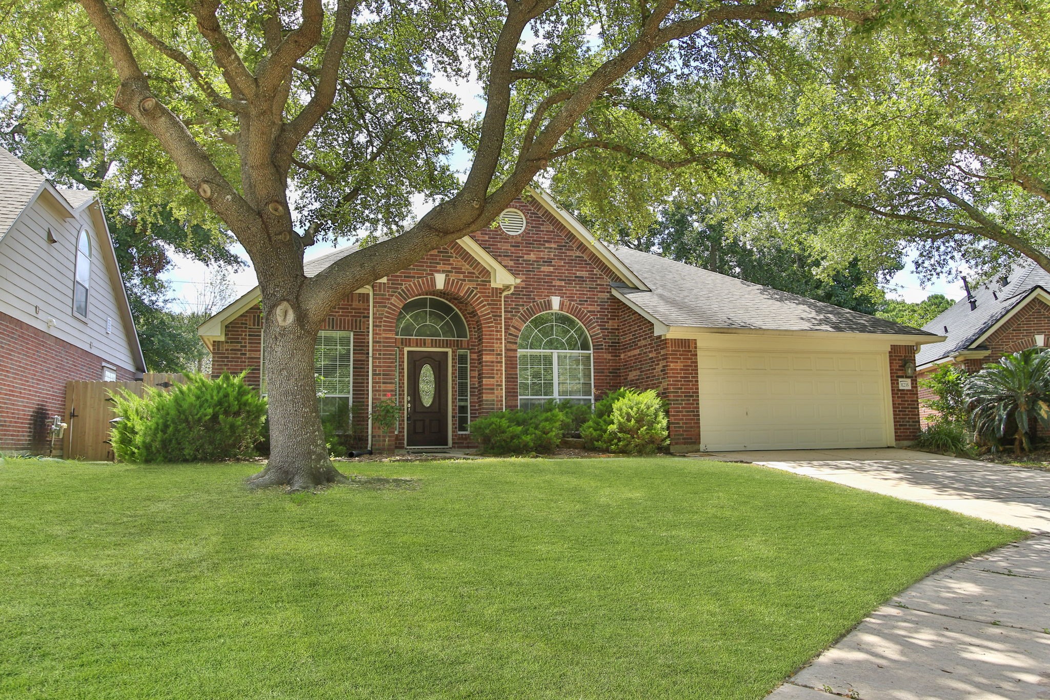 31235 Windcrest Park Lane Spring, TX 77386 - Photo 49 of 50 a front view of house with yard and green space