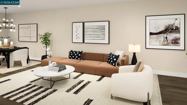 a living room with furniture and a table