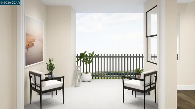 a view of a room with a glass top table and chairs