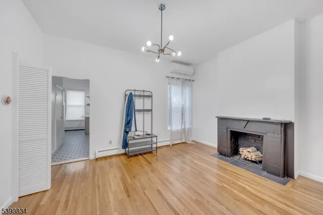 a view of hallway with closet and window