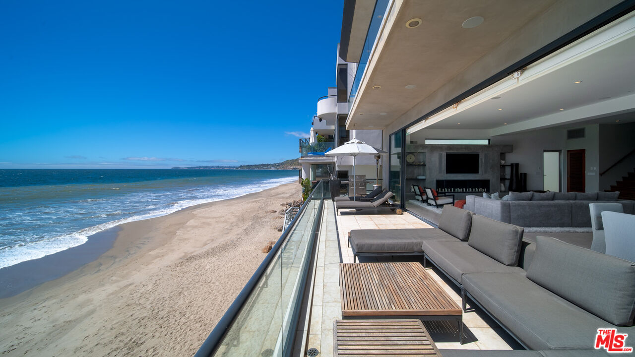 25250 Malibu Road Malibu, CA 90265 - Photo 30 of 66 a view of roof deck with couches and ocean view