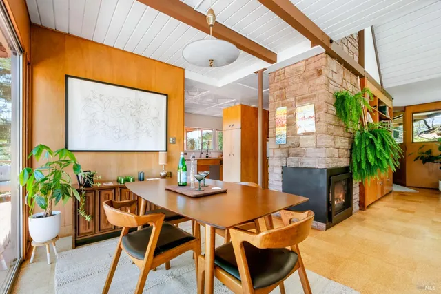 a kitchen with a stove a sink and a microwave