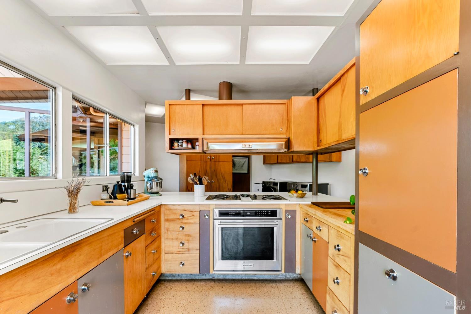 2140 Hyland Court Santa Rosa, CA 95404 - Photo 22 of 51 a kitchen with a stove a sink and a microwave
