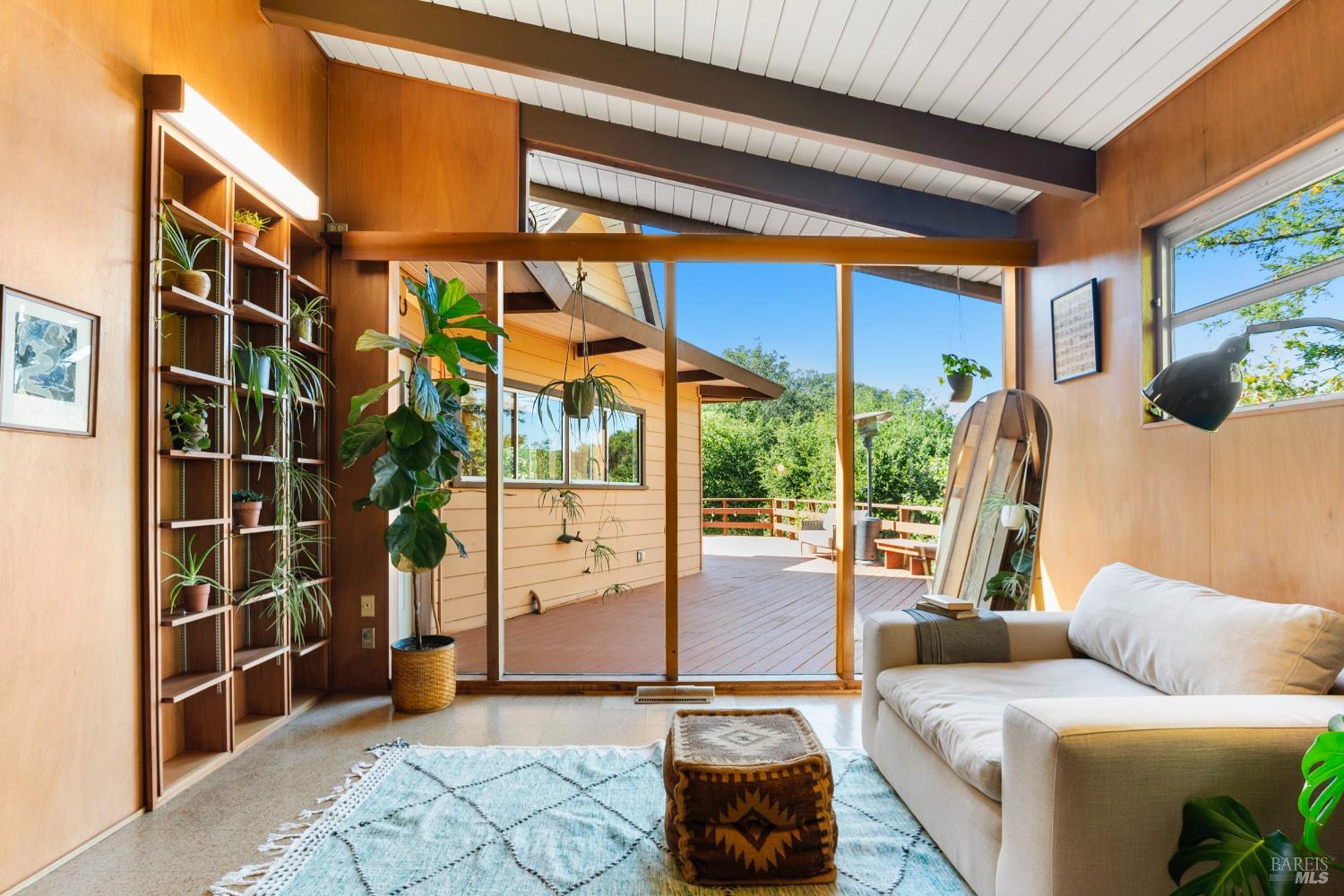 2140 Hyland Court Santa Rosa, CA 95404 - Photo 28 of 51 a living room filled with furniture and a floor to ceiling window