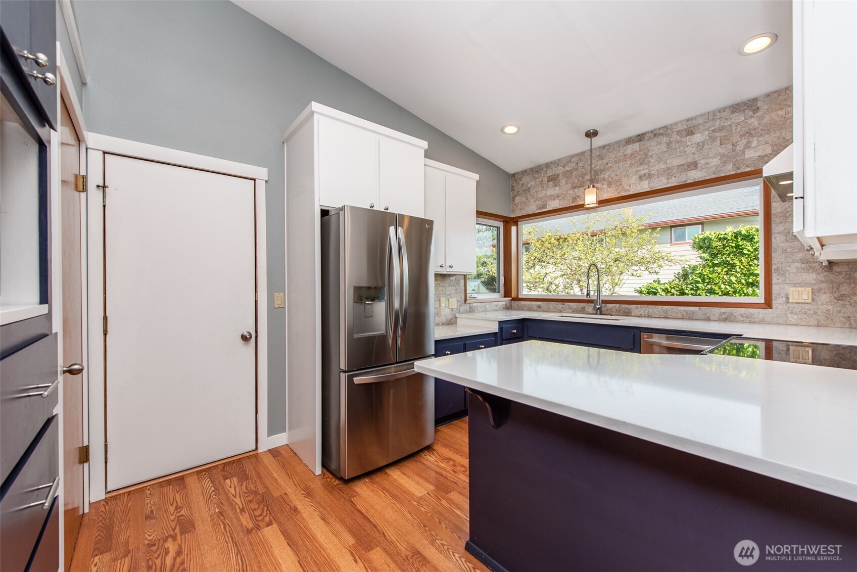 151 Nicole Place Sequim, WA 98382 - Photo 12 of 40 a kitchen with stainless steel appliances granite countertop a refrigerator and a sink
