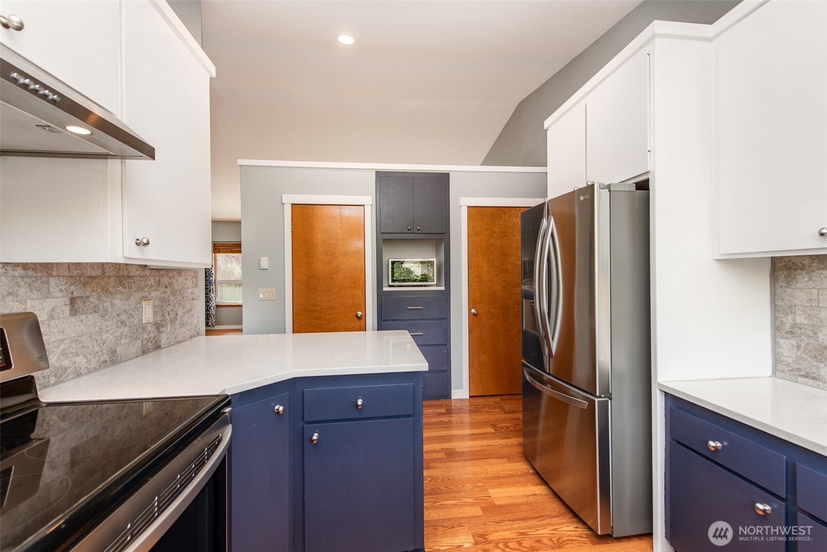 151 Nicole Place Sequim, WA 98382 - Photo 14 of 40 a kitchen with stainless steel appliances granite countertop a refrigerator and a sink