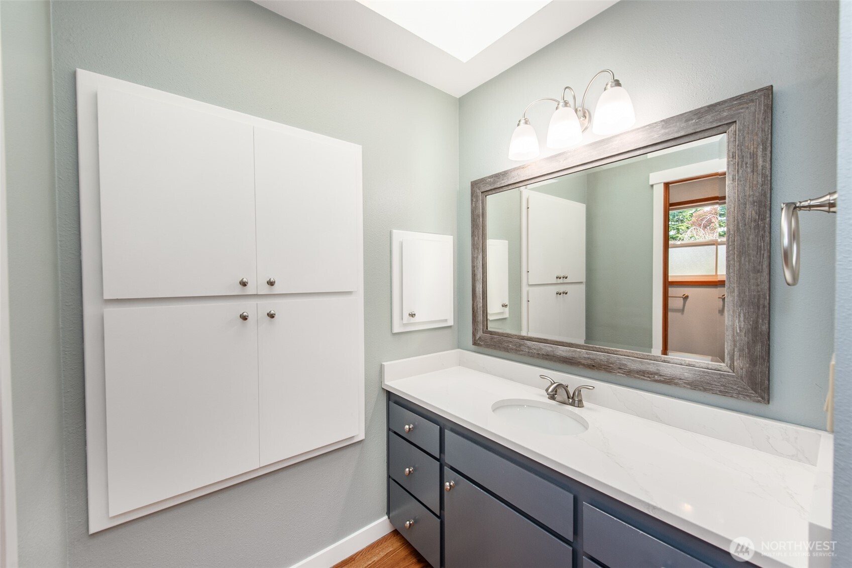 151 Nicole Place Sequim, WA 98382 - Photo 23 of 40 a bathroom with a sink and a mirror