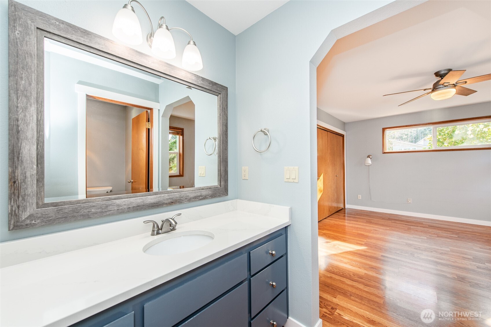 151 Nicole Place Sequim, WA 98382 - Photo 25 of 40 a bathroom with a sink and a mirror
